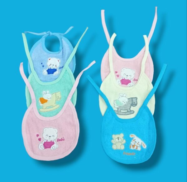 Babero toalla y plastico con tiras July Baby Art.100 Pack x 6