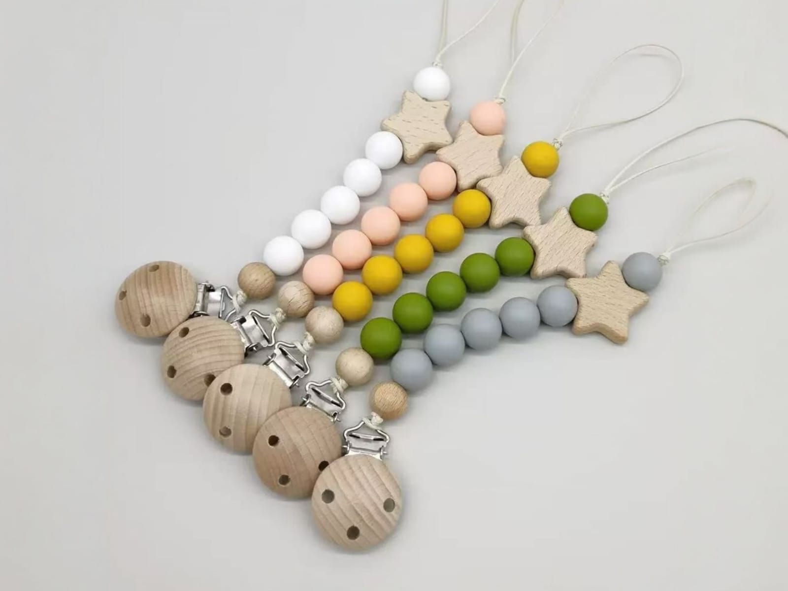 Portachupete Silicona Estrella con broche metal en bolsita individual Hermosa calidad