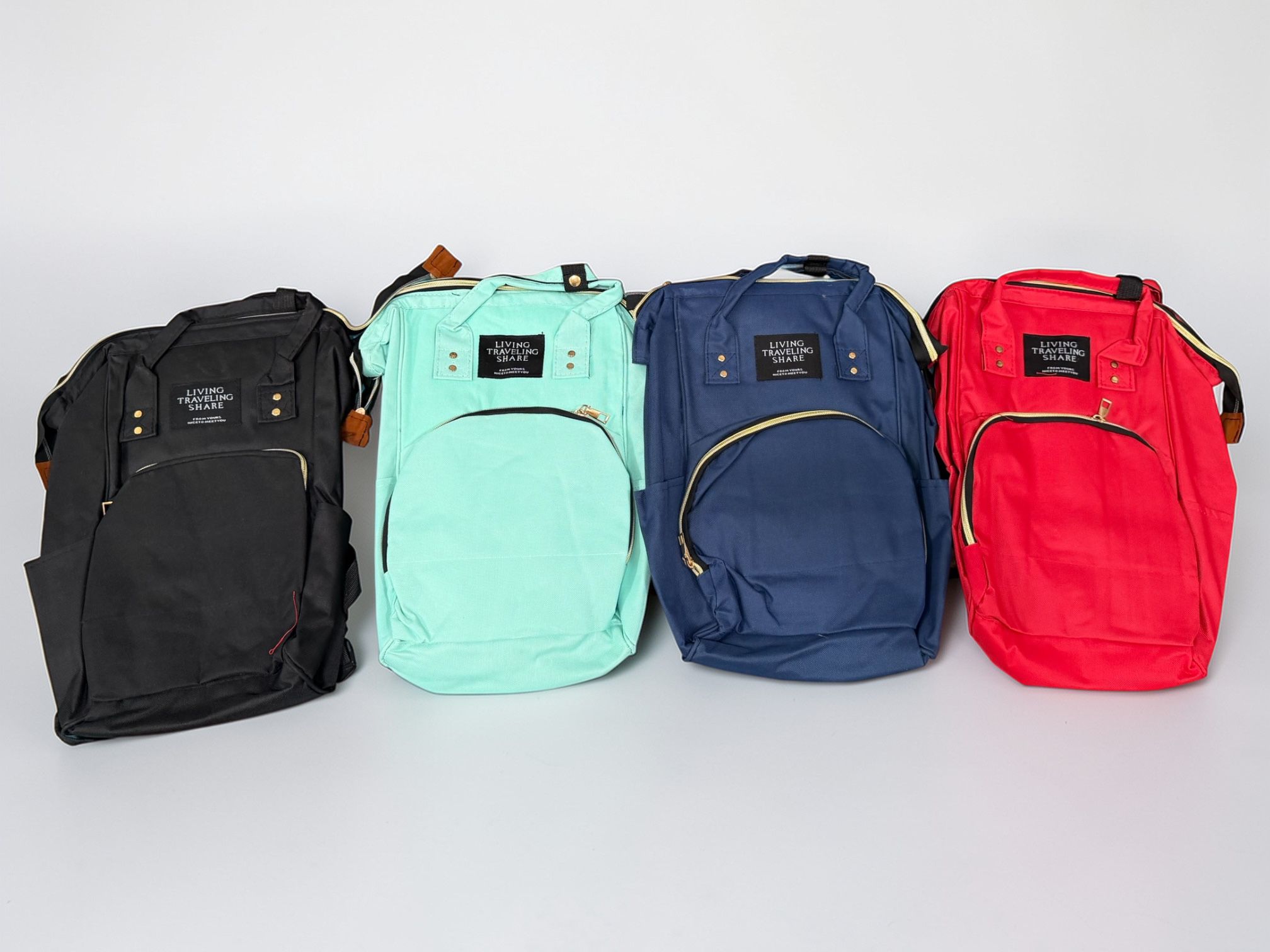 Mochila Maternal Gabardina Lisa "Living" Surtida de colores