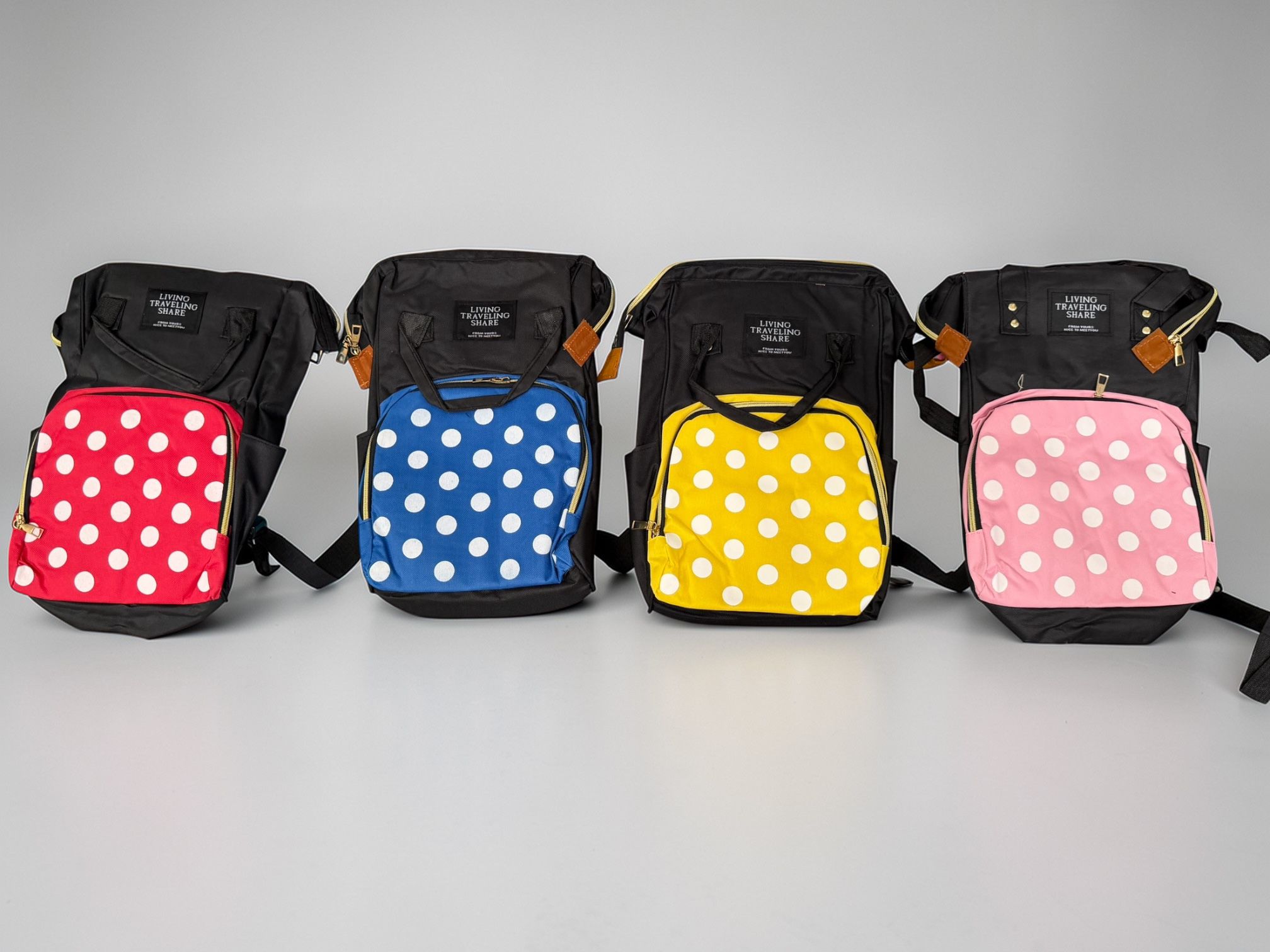 Mochila maternal Gabardina Lunares “Living” Surtida de colores